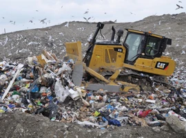 Caterpillar bulldozer working on a landfill