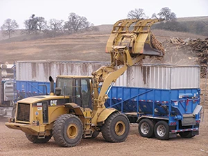 Photo of a wood processing operation at a landfill