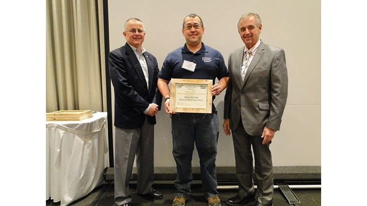 Plymouth Recycling Center Manager Jessie Jennings accepts the Outstanding Community Involvement Award from NH the Beautiful Board Members Larry Melanson (left) and John Dumais (right) May 21 in Manchester, New Hampshire.