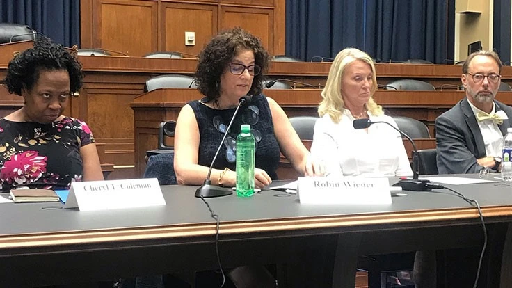 ISRI President Robin Wiener, second from left, addresses the Congressional Recycling Caucus. 
