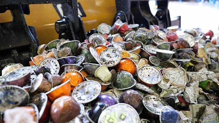 Nespresso coffee capsules, which are made from aluminum and are fully recyclable, being processed at Sims Municipal Recycling. 