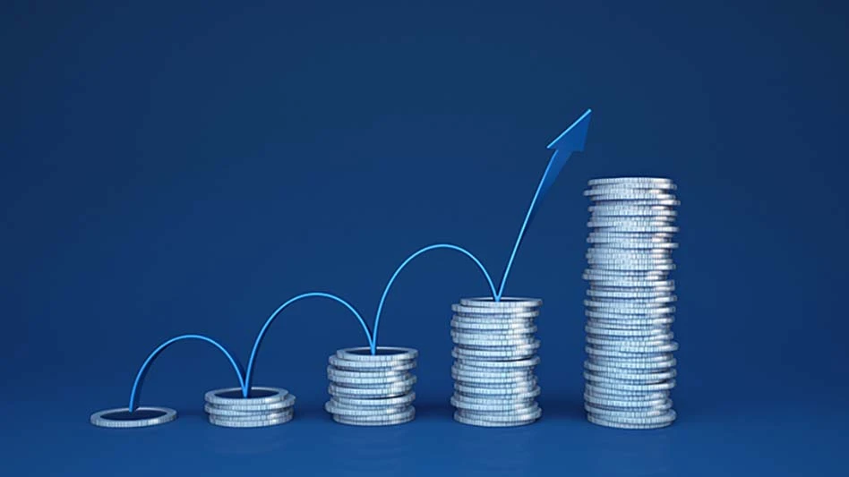 An image of coins showing growth in profits