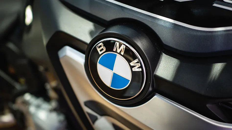 close up shot of bmw logo on car