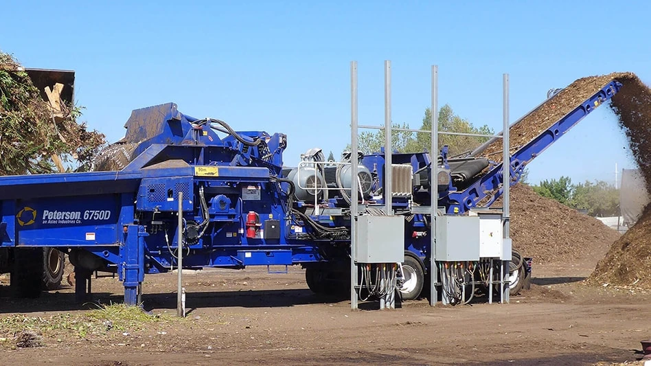 Astec Peterson horizontal wood grinder in action
