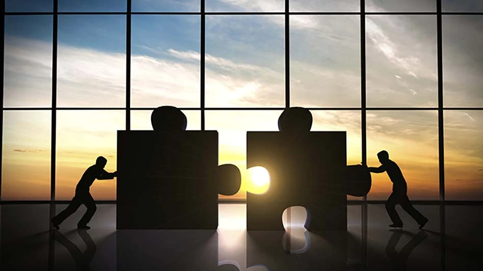 Digital graphic of two people pushing puzzle pieces together.