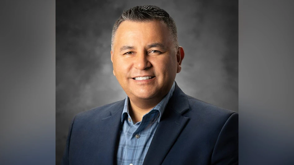 Head shot of Raul Pena.