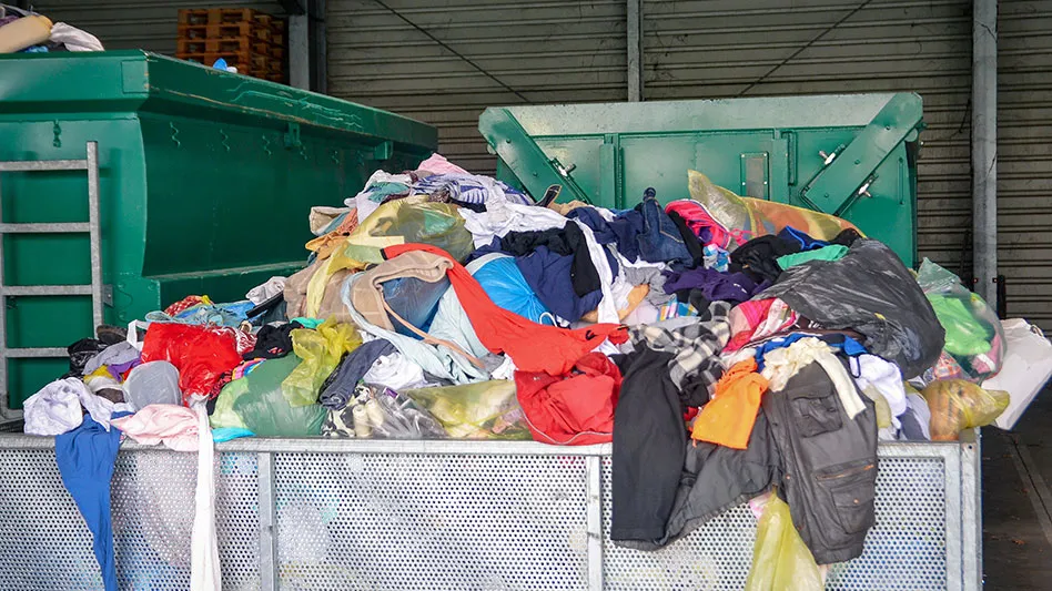 a container full of colorful clothes