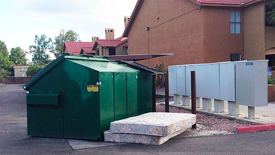 mattresses outside a multiunit residential building