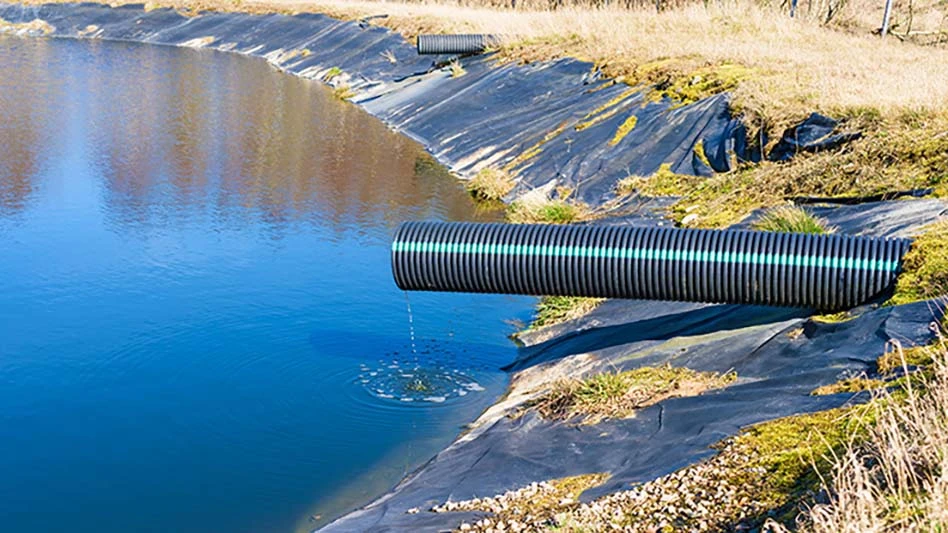water pipe extending over a body of water