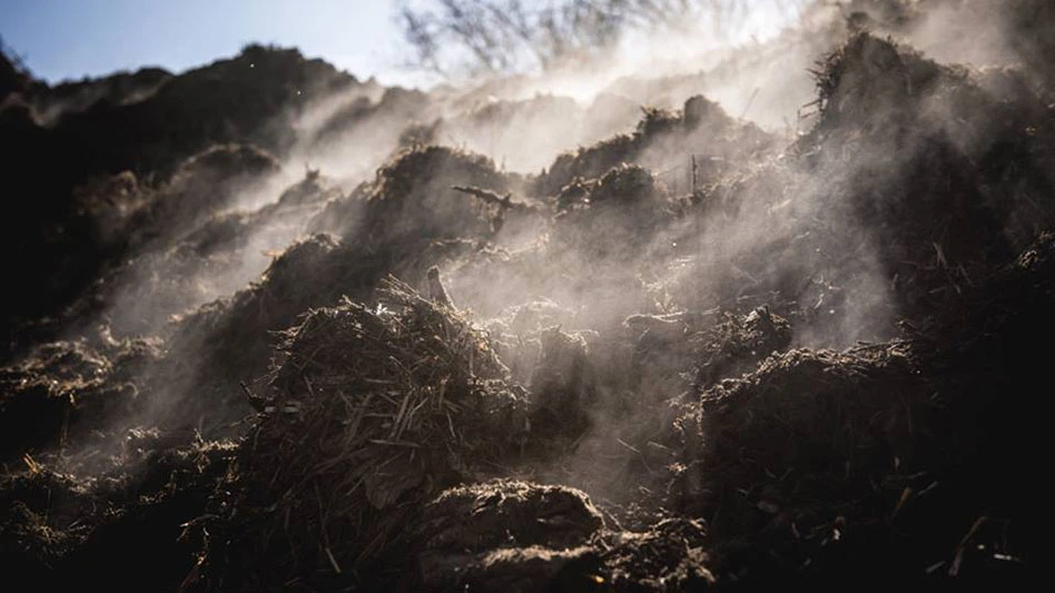 piles of compost with steam