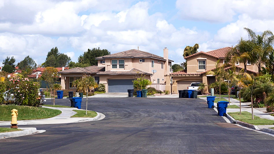 curbside recycling bins in a residential neighborhood