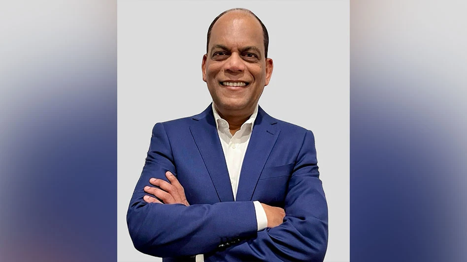 man smiling in blue suit