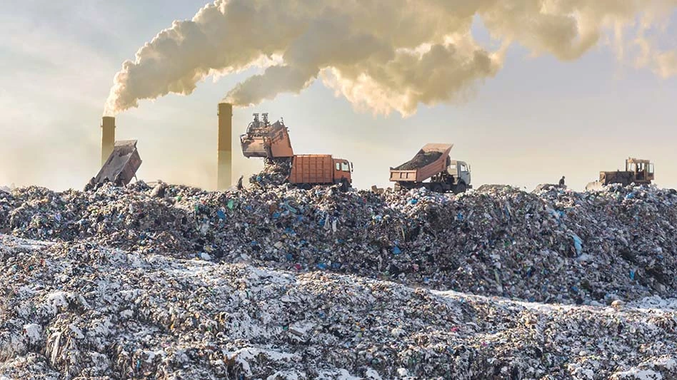 trucks operating on a landfill