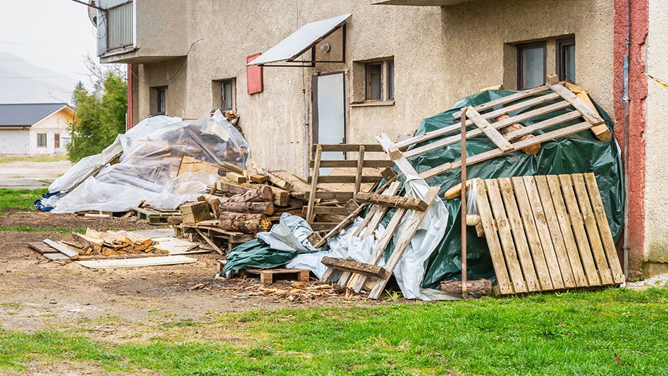 Bulk garbage day concept, miscellaneous rubbish items put on a street for council bulk waste collection