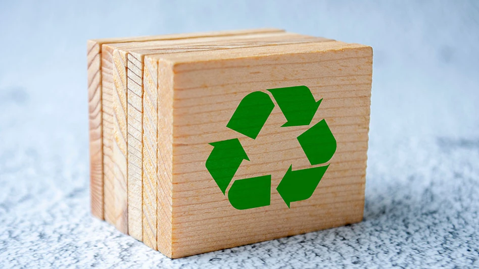 Recycle symbol on wooden square