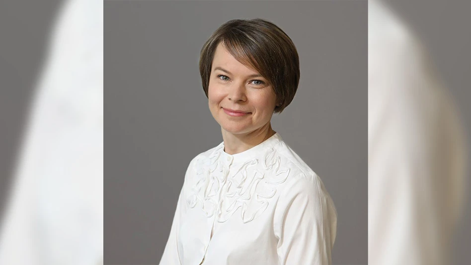 woman in white smiling