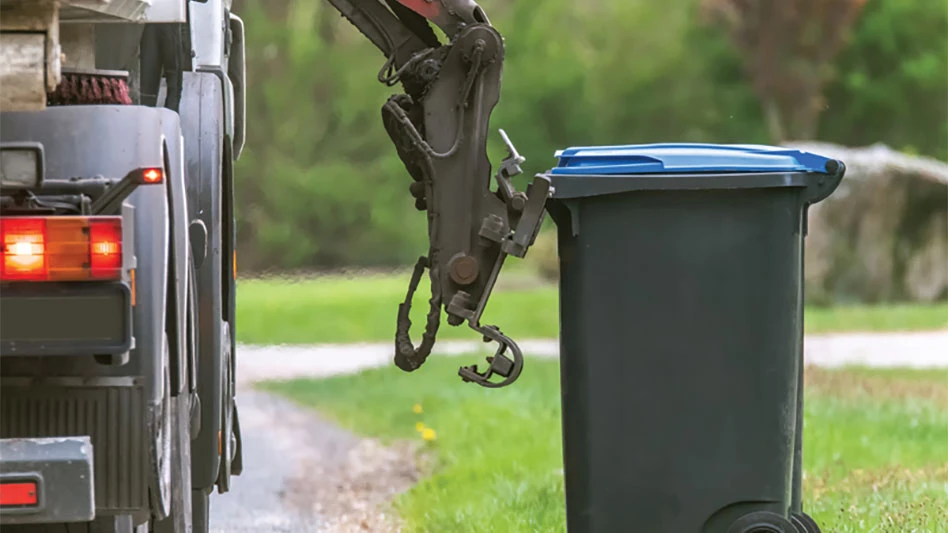 waste truck picking up collection cart