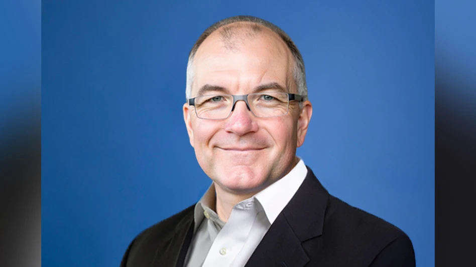 man in glasses smiling