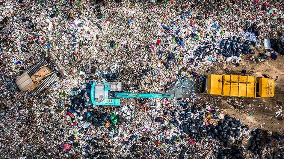 machines working at a landfill