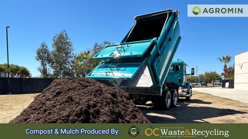 truck collecting mulch/compost material