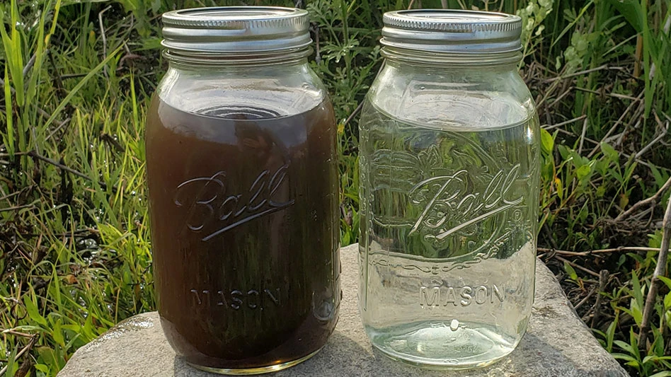 two mason jars with leachate and permeate