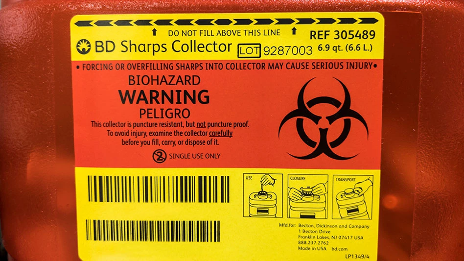 close-up of a sharps container