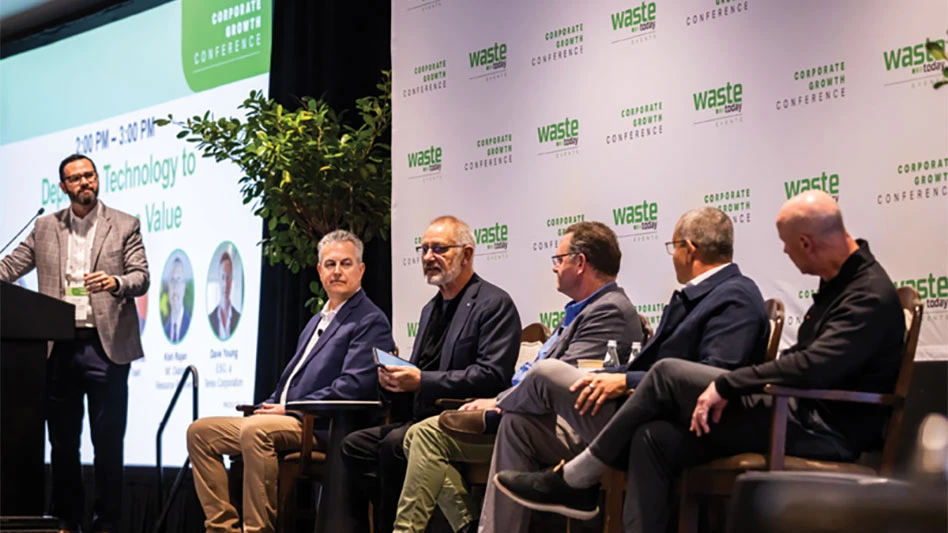 panel of speakers on a stage