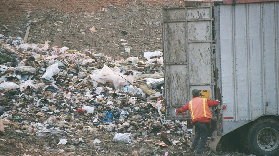 person working at a landfill